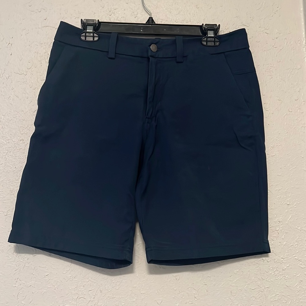 Blue men’s Lululemon 9 inch commission shorts